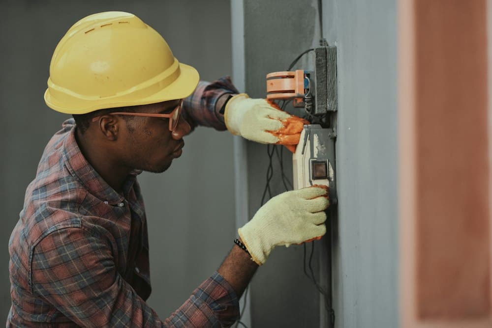 Solar technician reviewing system data on a tablet